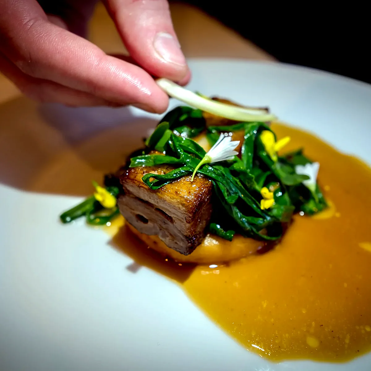 Pork belly with summer greens