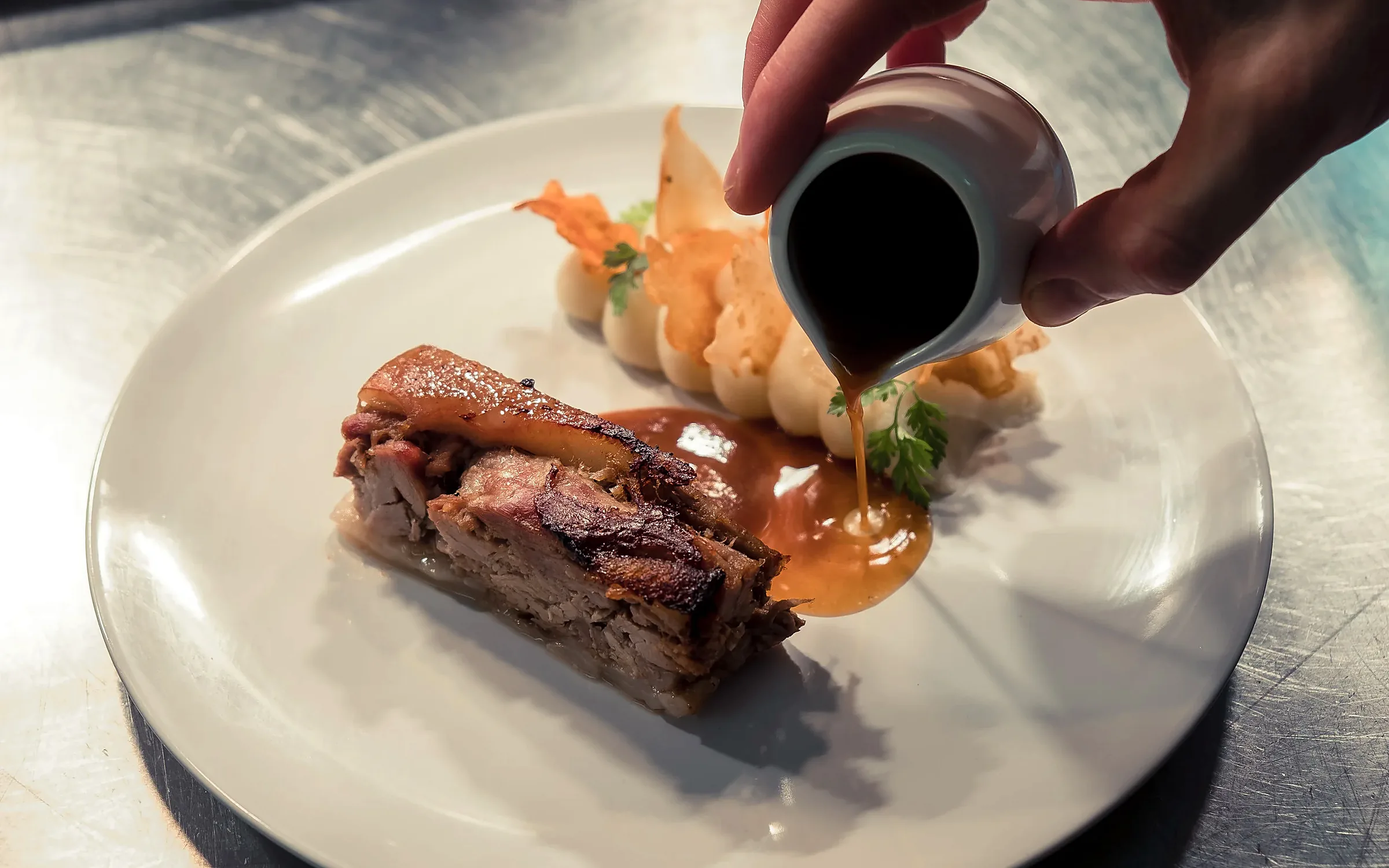 Jus poured at the pass — Gather's kitchen in motion